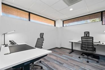 Home office setup with chair and writing table