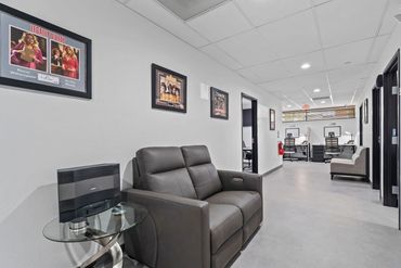 Leather office chair positioned by a desk