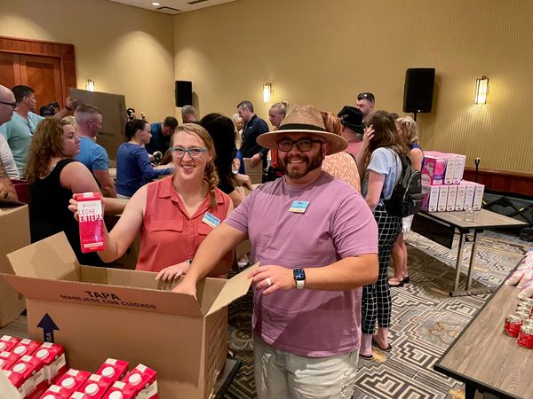 people stocking food bank supplies