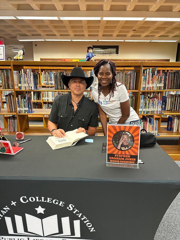Bea Saba, Library System Director, and Stephen Graham Jones at Nov. 18 book signing