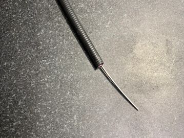 9/32 Outside Diameter with Teflon Liner.
1/16 Diameter inner Stainless Steel wire.