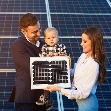 Family with solar panels on the roof