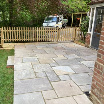 Entrance way with sandstone  and fencing 