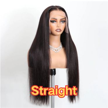 Mannequin wearing a long, straight black wig with makeup and a necklace.