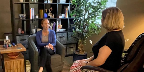 therapist talking with a client