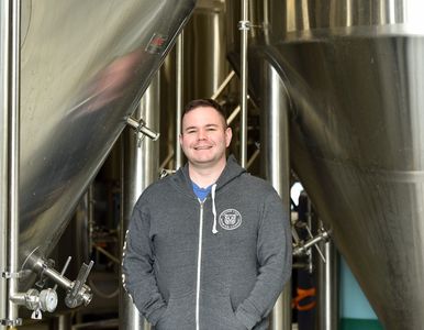 John O'Flaherty Facilities Manager (headshot of him by the tanks in the brewhouse)