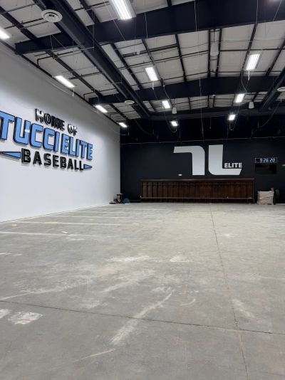 Empty indoor sports training facility for baseball.