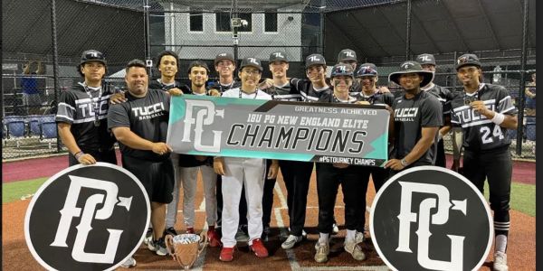 Baseball team celebrating championship win.