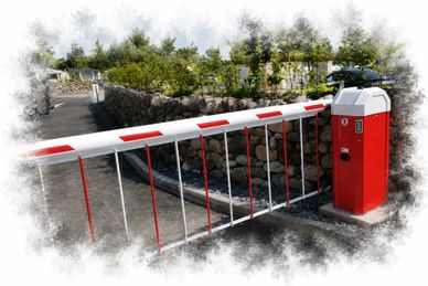 A red and white automatic barrier gate blocking a driveway.
