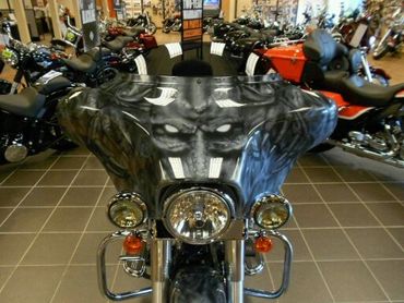 An ominous front faring of this 2008 Harley Davidson , custom painted in 2008 by Joe Platia.