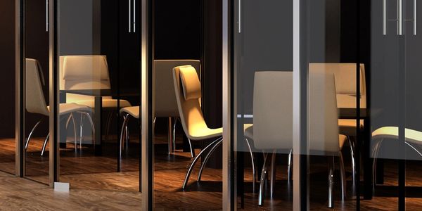 Series of glass-fronted meeting rooms next to each other