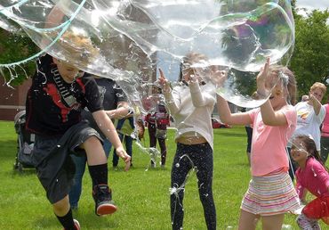You have never seen such excitement and fun as kids playing in GpopB's  giant soap bubbles.  