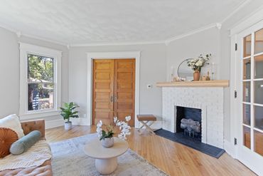 Parlor/Grand Room of 1890s home restored in Janesville, WI by MDR Design Co.