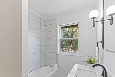 Secondary bathroom of 1890s home restored in Janesville, WI by MDR Design Co.