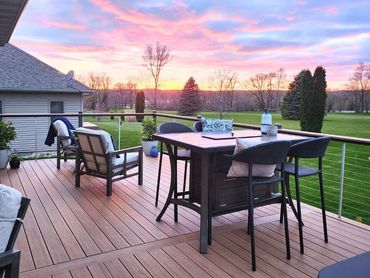 View overlooking newly expanded outdoor deck off of primary ensuite in Dane County by MDR Design Co.