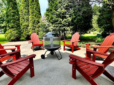 backyard firepit of a vacation rental in Janesville, WI decorated by the MDR Design Team