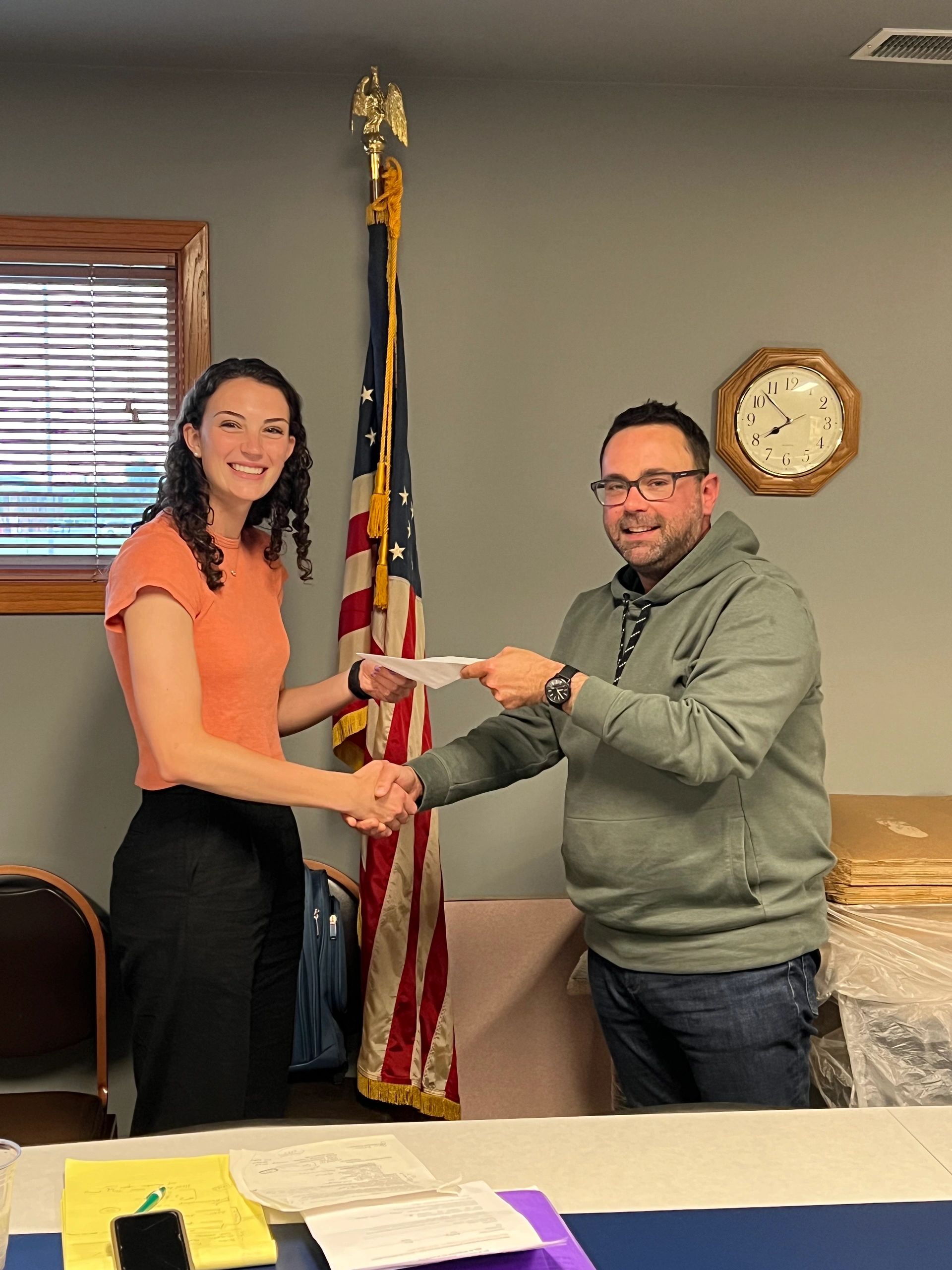 Katie Jackowski receives her scholarship from SBC President Sal Muffoletto