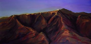 scene of a mountain after the last light of a sunset
