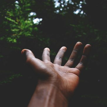 A human reaching out a helping hand