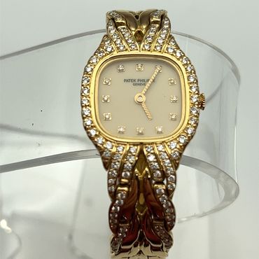 Gold and diamond Patek Philippe watch World Gem Labs buys and appraised.