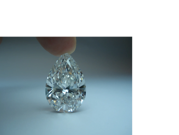 Loose 7 carat pear shape natural diamond.