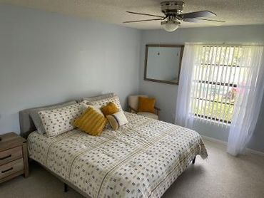 Master bedroom with a king size bed