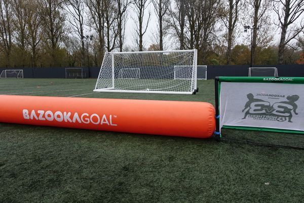 Inflatable Bazooka Goal on a soccer field.