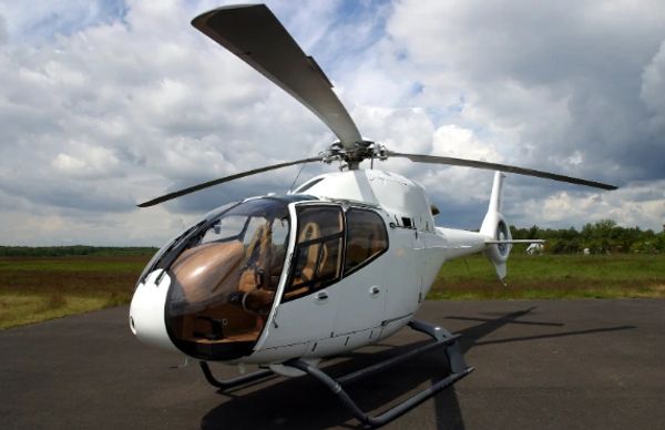 Helicopter charter landing at a private event venue