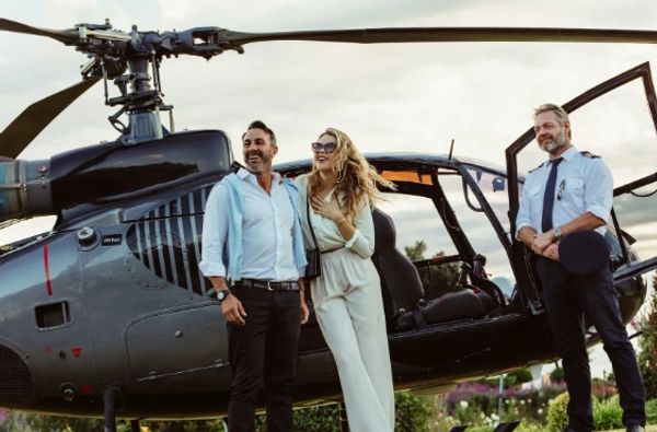 Helicopter charter landing at a private event venue