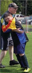 My Goalie giving me a BIG hug after we won Washgington State Regionals!