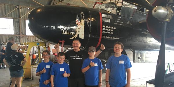 School tour includes a vintage war bird the A-26 Lady Liberty Invader, an actively flying aircraft.