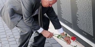 Laying flowers at the Wall on Rose Day