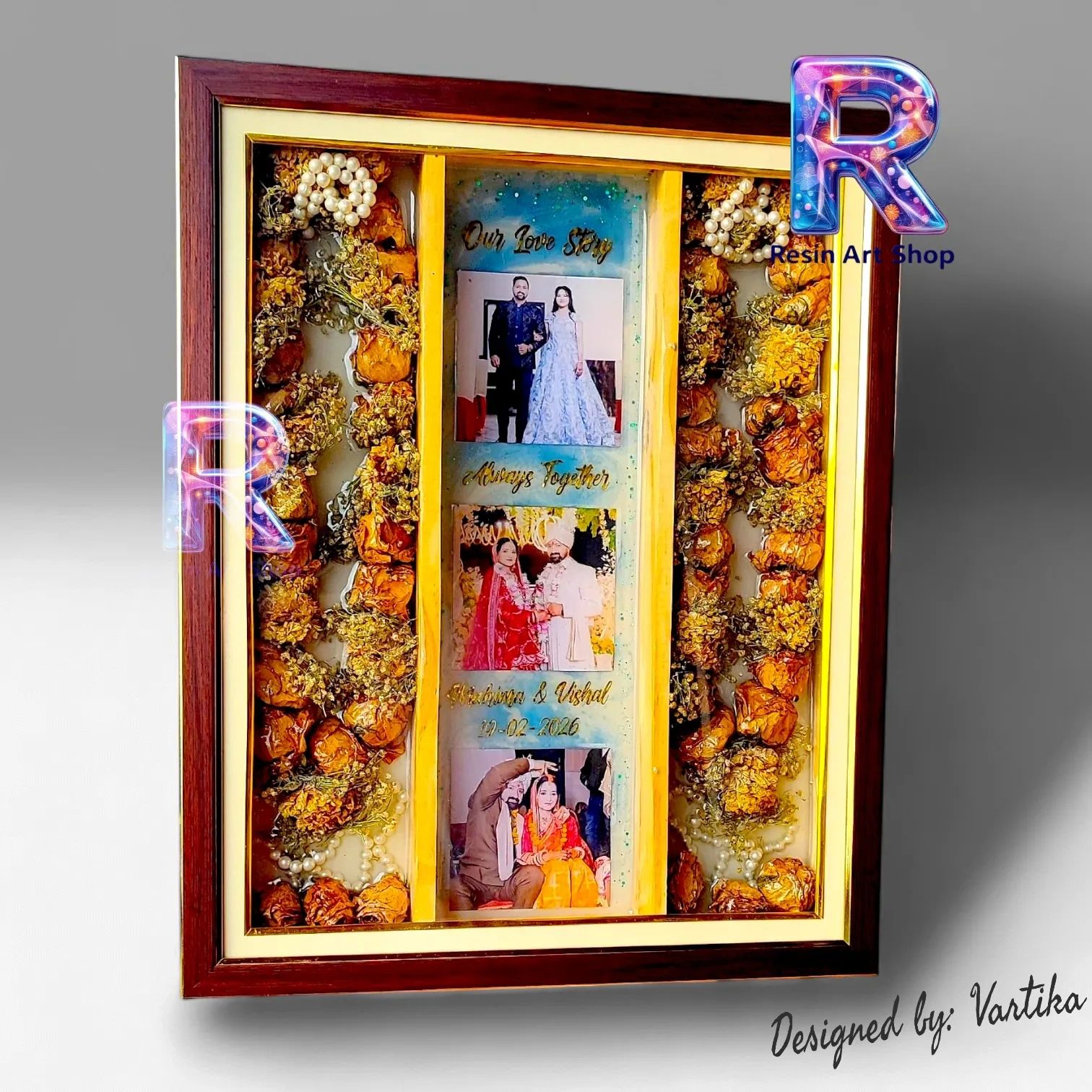 Framed wedding photo collage with dried flowers and pearls, celebrating love and togetherness.