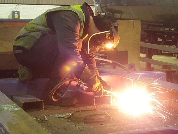 An engineer welding