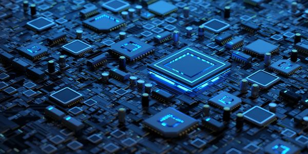 Close-up of a glowing blue microchip on a circuit board with various electronic components.