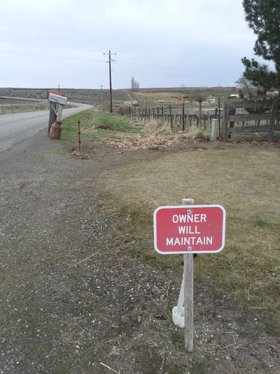 Roadside "Owner Will Maintain" sign