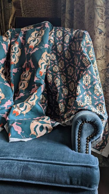 Fox and Hare fabric in two motif sizes.