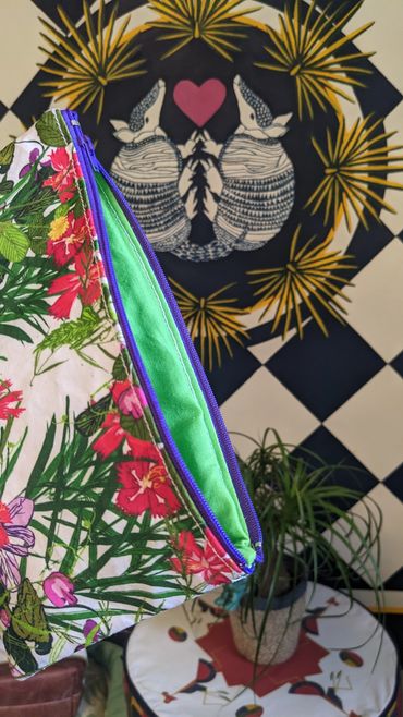 Sweet William in the Weeds zipper pouch.  Armadillo and Palmetto floorcloth.  Mantis and Ootheca sli