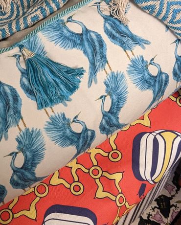 Heron Pillow.  Possomdillo Ottoman.  Fantasy Frog and Dianthus floormat.