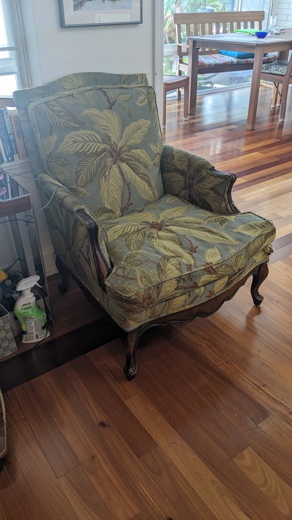 "Before" 
The botanical fabric on my client's chairs was worn from years of good use.  The spring sy