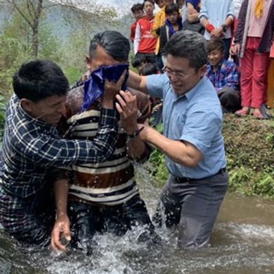 Baptism in a local river