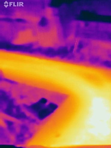 Thermal image of a sidewalk ice melt system powered by a Navien high efficient boiler in Shakopee.