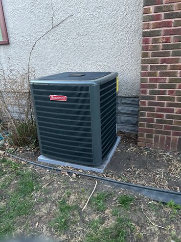 Air conditioner installed in a house that has boiler heat in south Minneapolis.