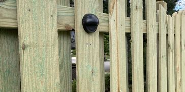 Fence lighting to help illuminate the perimeter of the backyard.