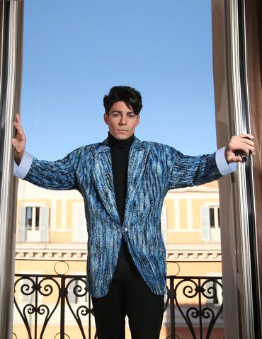 man wearing fancy outfit