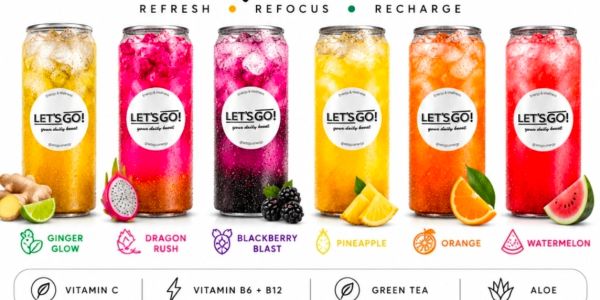 Colorful bottled beverages of various fruit flavors.