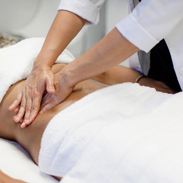Med Spa Professional Doing Lymphatic Massage to a Woman