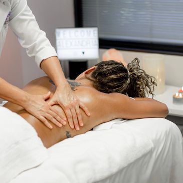 Med Spa Professional Doing Relaxation Massage to a Woman
