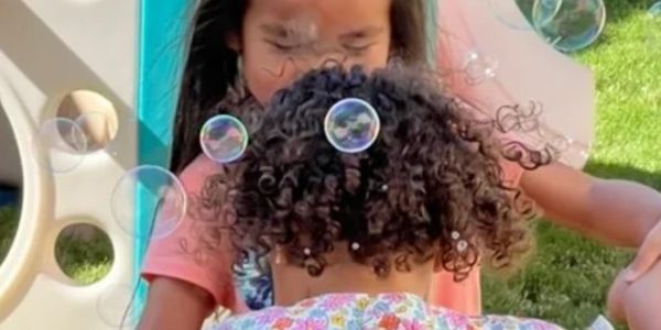 2 Girls Playing Outside