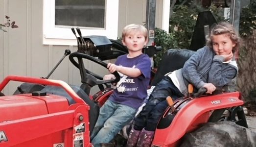 Tawni Angel's kids riding a tractor